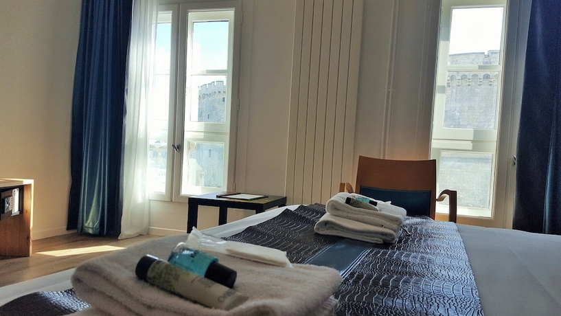 Imagen de la habitación del Hotel Maisons Du Monde and Suites - La Rochelle Vieux Port. Foto 4