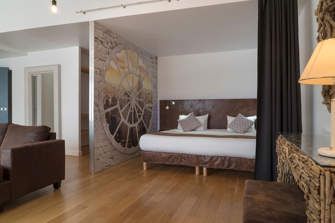 Imagen de la habitación del Hotel Maisons Du Monde and Suites - La Rochelle Vieux Port. Foto 5