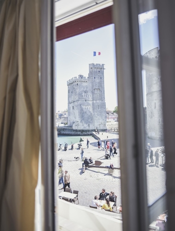 Imagen de la habitación del Hotel Maisons Du Monde and Suites - La Rochelle Vieux Port. Foto 8
