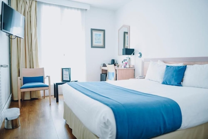 Imagen de la habitación del Hotel Maisons Du Monde and Suites - La Rochelle Vieux Port. Foto 10