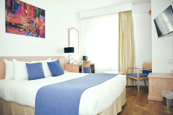 Imagen de la habitación del Hotel Maisons Du Monde and Suites - La Rochelle Vieux Port. Foto 13