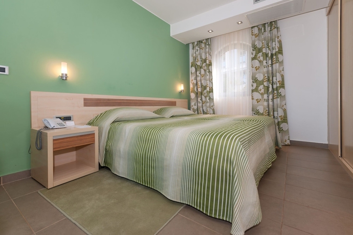 Imagen de la habitación del Hotel Maistra Resort Belvedere. Foto 3