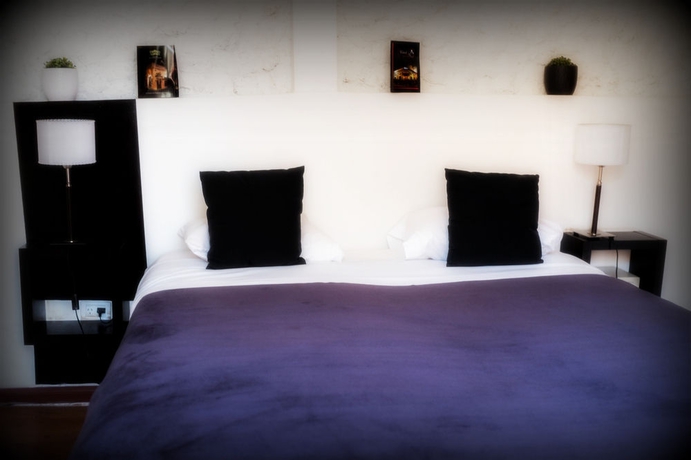 Imagen de la habitación del Hotel Maitre Boutique. Foto 12