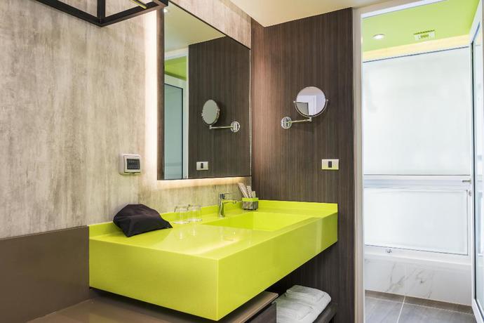 Imagen de la habitación del Hotel Maitria Rama 9 Bangkok. Foto 7