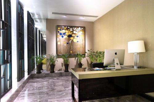 Imagen de los interiores del Hotel Maixinge Boutique Chuansha Branch. Foto 9
