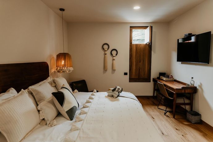 Imagen de la habitación del Hotel Majagua Boutique Adults Only. Foto 4