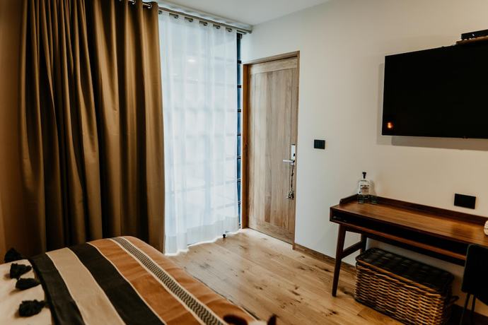 Imagen de la habitación del Hotel Majagua Boutique Adults Only. Foto 8