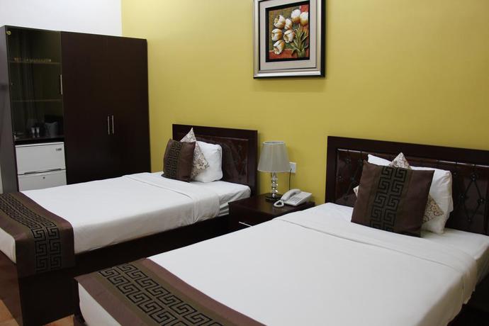Imagen de la habitación del Hotel Majan Guest House. Foto 7