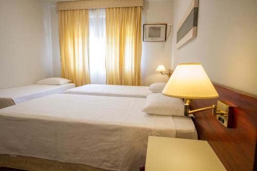 Imagen de la habitación del Hotel Majestic, &Aacute;guas de Lind&oacute;ia. Foto 7