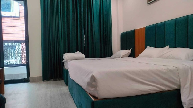 Imagen de la habitación del Hotel Majestic Ganges. Foto 8
