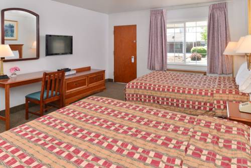 Imagen de la habitación del Hotel Majestic Inn and Suites. Foto 3