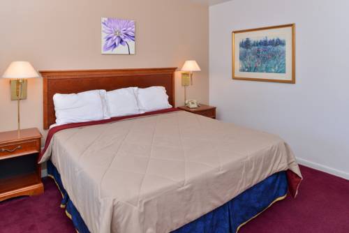 Imagen de la habitación del Hotel Majestic Inn and Suites. Foto 5