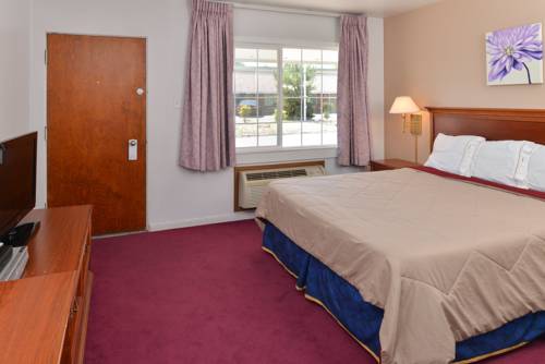 Imagen de la habitación del Hotel Majestic Inn and Suites. Foto 6