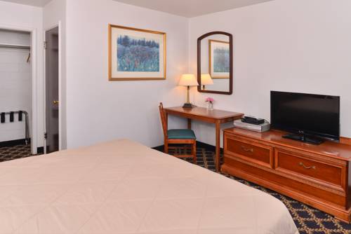 Imagen de la habitación del Hotel Majestic Inn and Suites. Foto 10