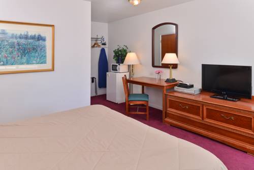 Imagen de la habitación del Hotel Majestic Inn and Suites. Foto 11