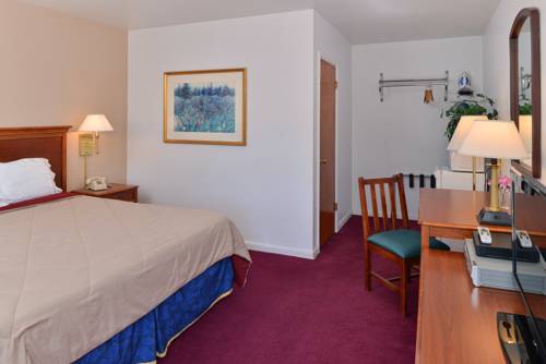 Imagen de la habitación del Hotel Majestic Inn and Suites. Foto 12