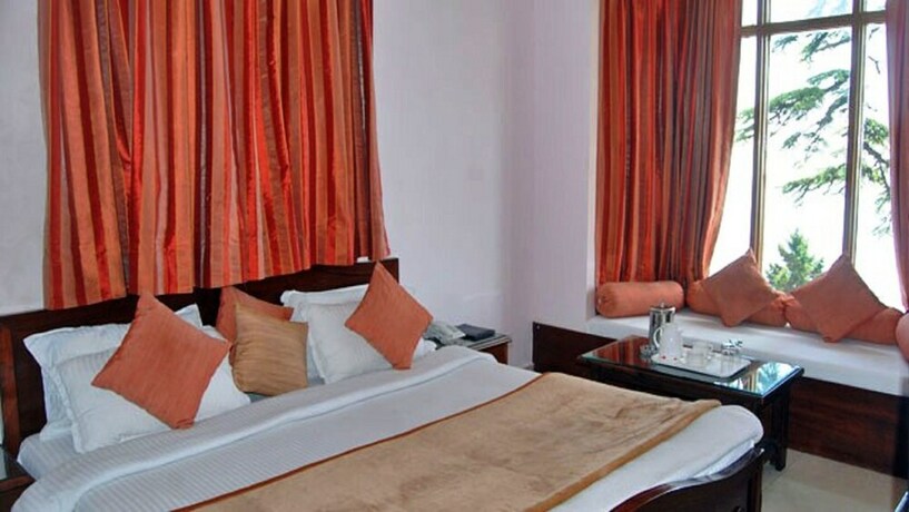 Imagen de la habitación del Hotel Majestic Oak Bush. Foto 22