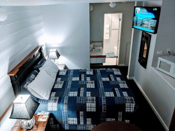 Imagen de la habitación del Hotel Majestic Rockies Motel. Foto 8
