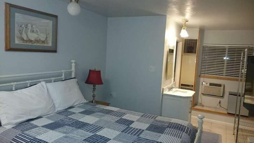 Imagen de la habitación del Hotel Majestic Rockies Motel. Foto 9