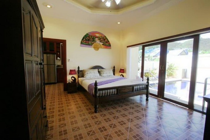 Imagen de la habitación del Hotel Majestic Villas Phuket. Foto 11