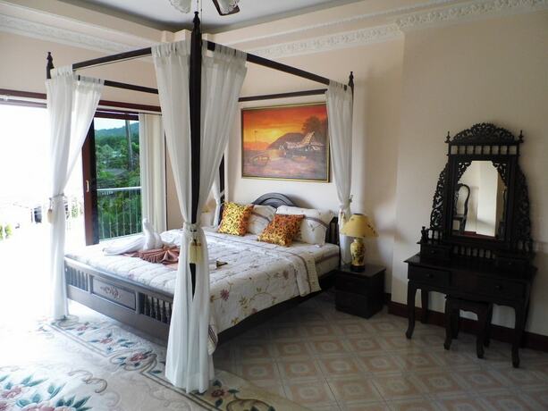 Imagen de la habitación del Hotel Majestic Villas Phuket. Foto 20