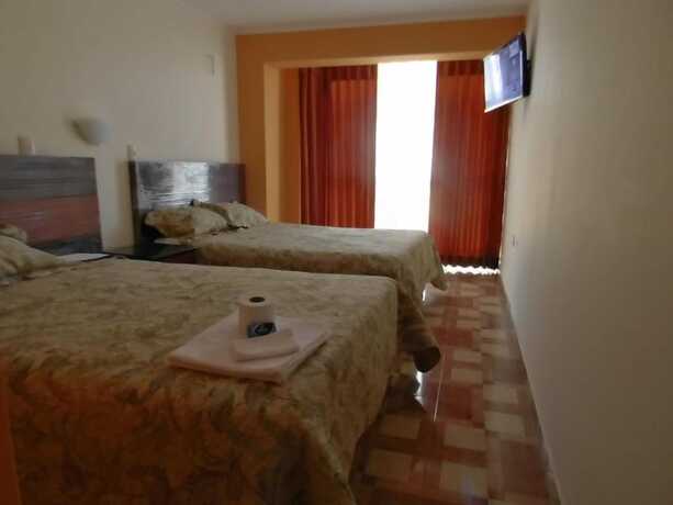 Imagen de la habitación del Hotel Majhami. Foto 16