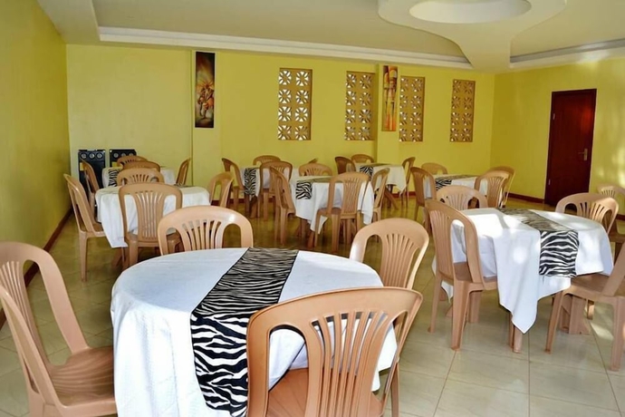 Imagen del bar/restaurante del Hotel Mak Cottages. Foto 7