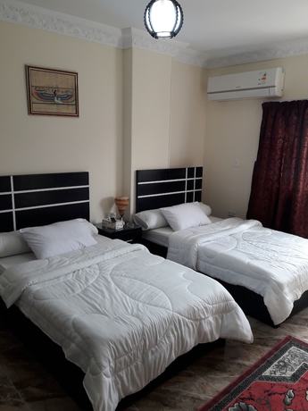 Imagen de la habitación del Hotel Makadi Pyramids View. Foto 11