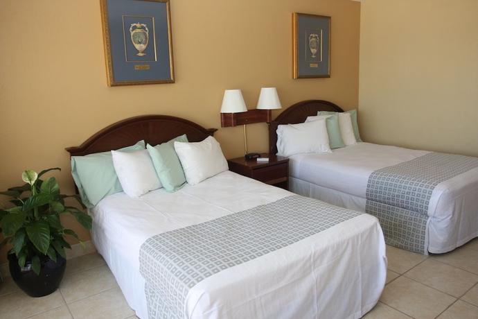 Imagen de la habitación del Hotel Makai Beach Lodge. Foto 11