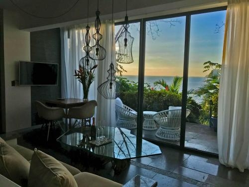 Imagen de la habitación del Hotel Makanda By The Sea Adults Only. Foto 8