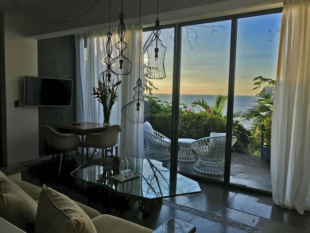 Imagen de la habitación del Hotel Makanda By The Sea. Foto 17