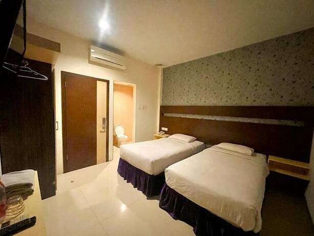 Imagen de la habitación del Hotel Makassar, Masale. Foto 5