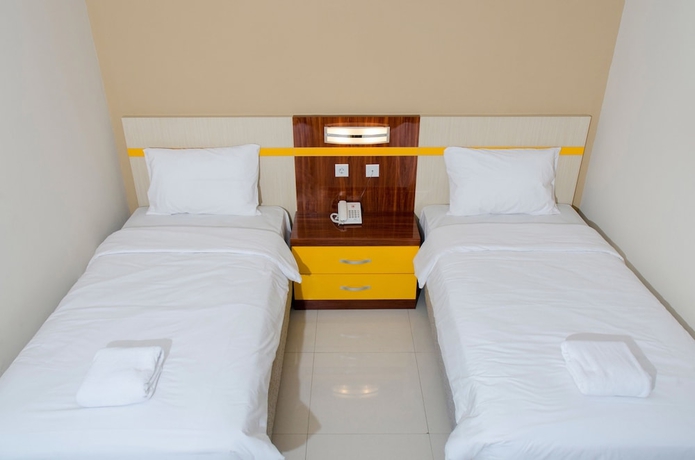 Imagen de la habitación del Hotel Makati Cibitung. Foto 6