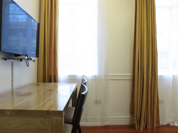 Imagen de la habitación del Hotel Makati Riverside Inn. Foto 4