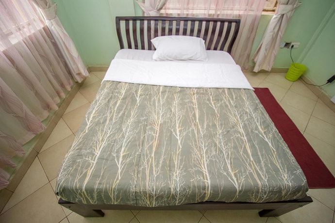 Imagen de la habitación del Hotel Makerere Serene. Foto 8