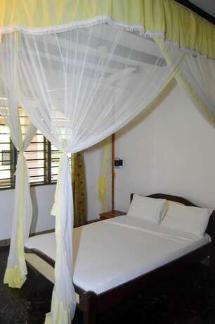 Imagen de la habitación del Hotel Makuti Villas Resort. Foto 19