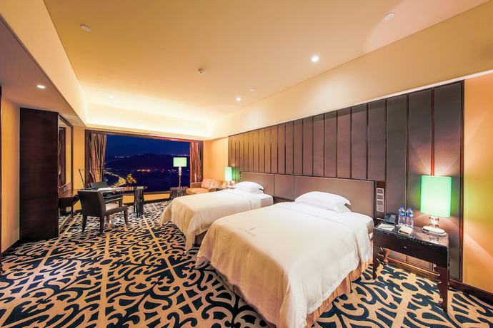 Imagen de la habitación del Hotel Malachite Dongguan. Foto 2