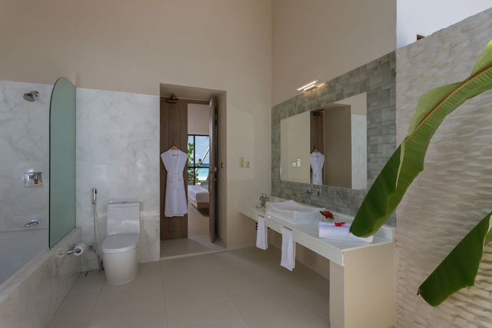 Imagen de la habitación del Hotel Malahini Kuda Bandos Resort. Foto 7