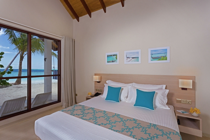 Imagen de la habitación del Hotel Malahini Kuda Bandos Resort. Foto 9