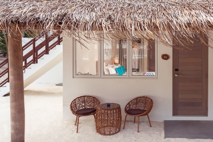 Imagen de la habitación del Hotel Malahini Kuda Bandos Resort. Foto 10