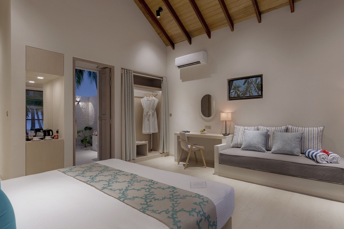 Imagen de la habitación del Hotel Malahini Kuda Bandos Resort. Foto 14