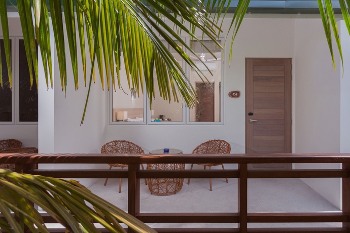 Imagen de la habitación del Hotel Malahini Kuda Bandos Resort. Foto 15