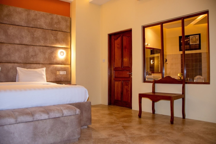 Imagen de la habitación del Hotel Malaika Beach Resort. Foto 5