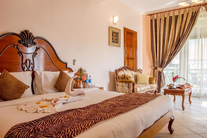 Imagen de la habitación del Hotel Malaika Beach Resort. Foto 7