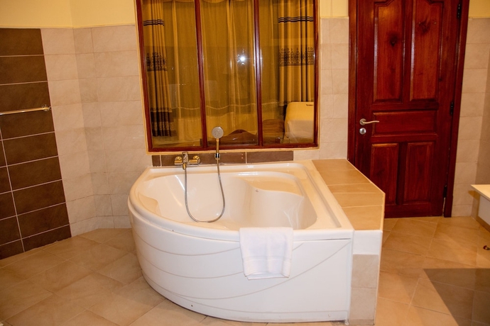 Imagen de la habitación del Hotel Malaika Beach Resort. Foto 16