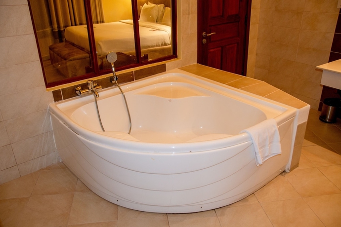 Imagen de la habitación del Hotel Malaika Beach Resort. Foto 18