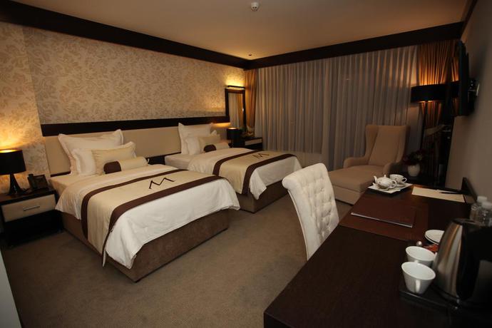 Imagen de la habitación del Hotel Malak Regency. Foto 6