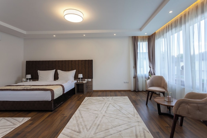 Imagen de la habitación del Hotel Malak Resort. Foto 13