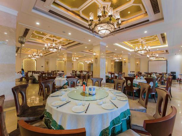 Imagen del bar/restaurante del Hotel Malanhua Holiday Hotel Sanya. Foto 4