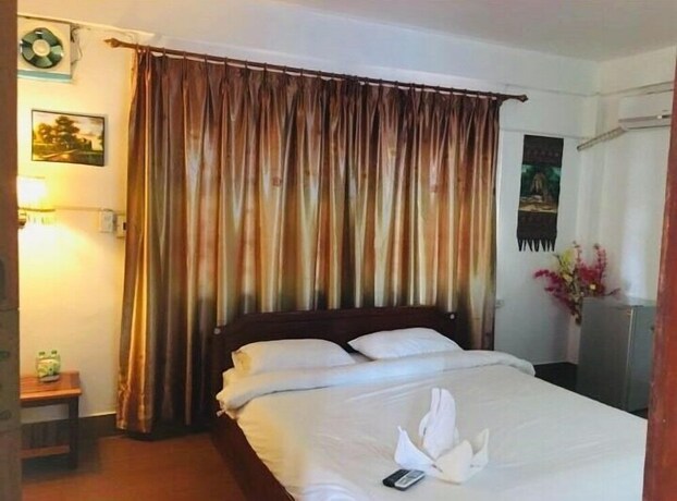 Imagen de la habitación del Hotel Malany Villa 1. Foto 13